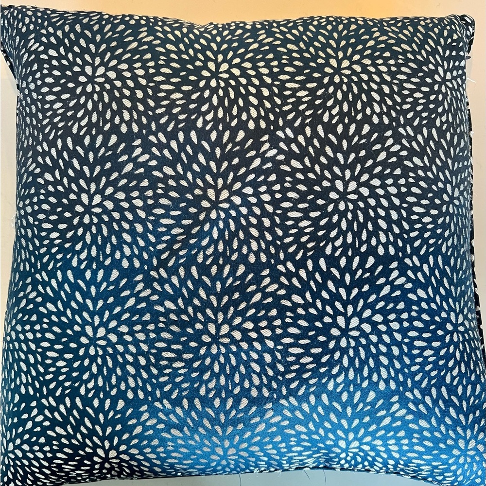 At Home throw pillows (2) with silver pattern.